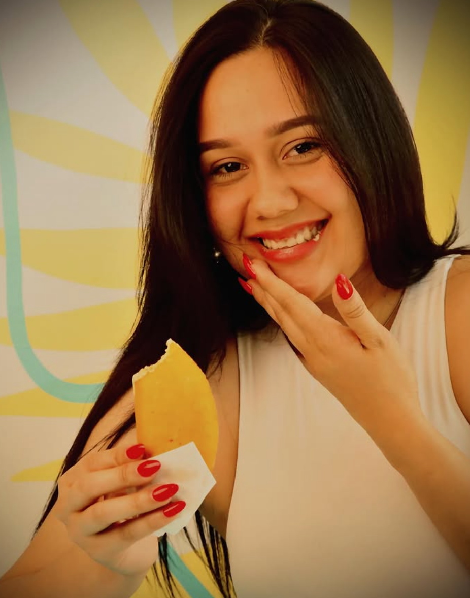 Guest enjoying a fresh empanada