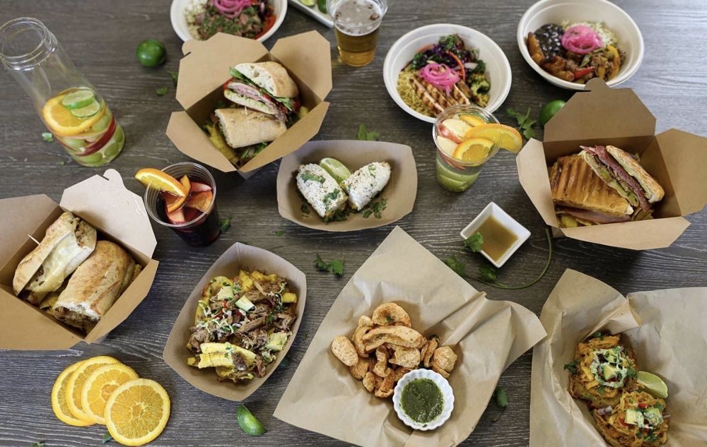 Sandwiches, bowls, chicharrones and drinks laid out