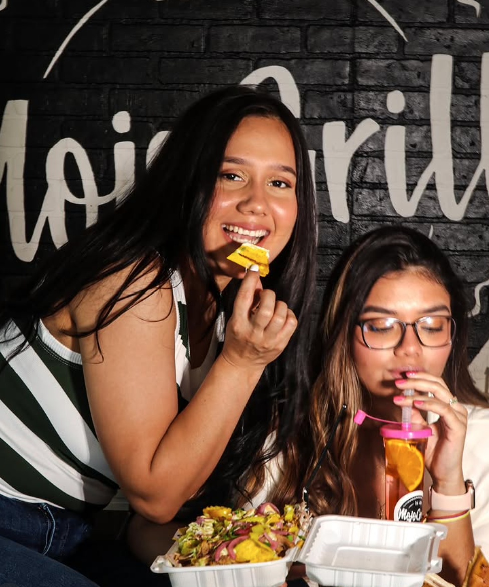Friends sharing Cuban Nachos